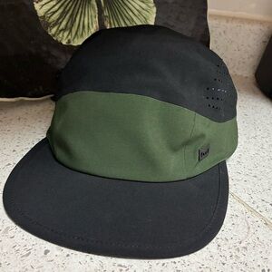 Melin A Game Hat Cap Hydro Adjustable Performance Snapback 58cm green and black